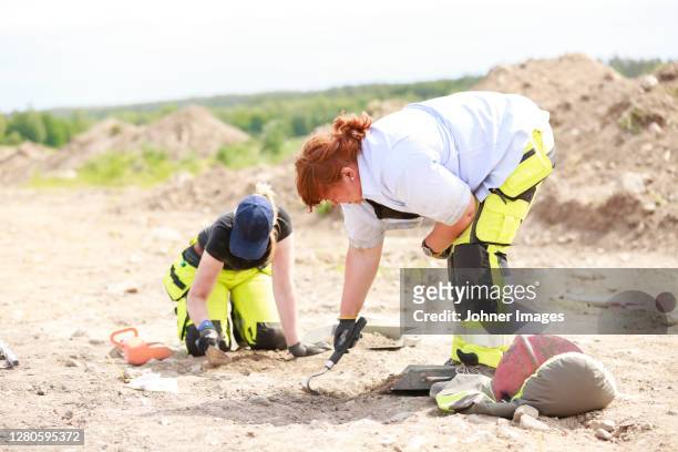 archaeologists at work - archaeology stock pictures, royalty-free photos & images