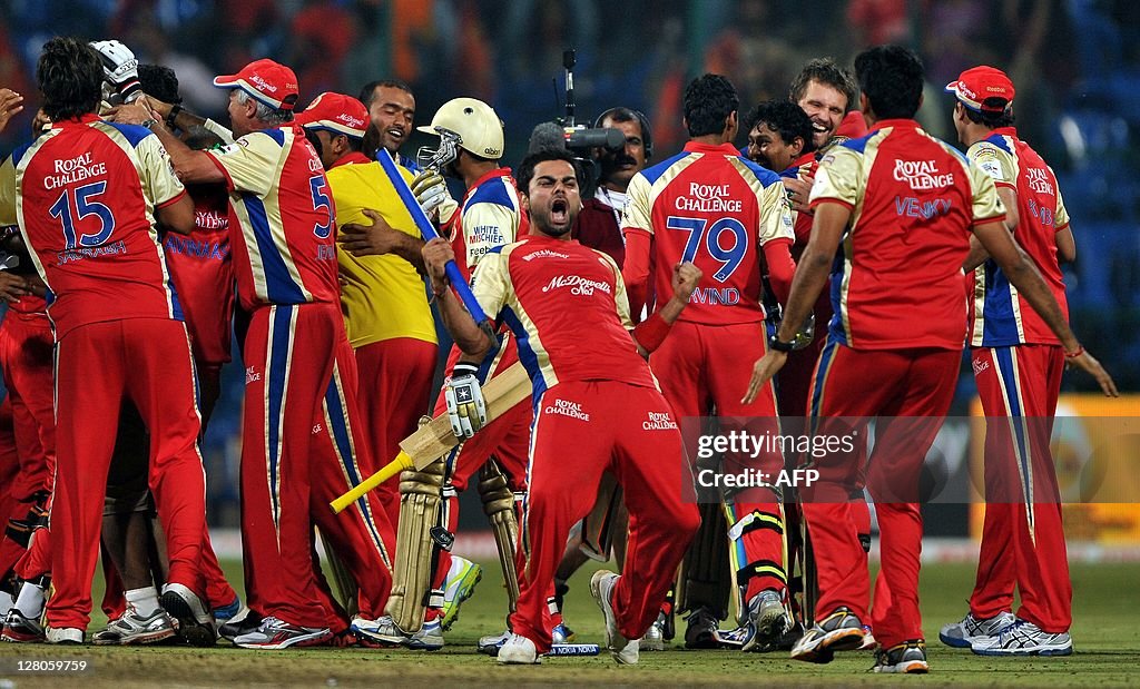 Royal Challengers Bangalore players celebrate after beating South ...