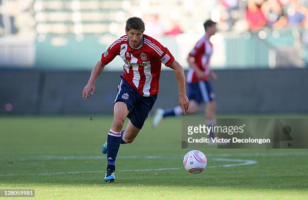 Andrew Boyens of Chivas USA runs back to control the ball on defense during the MLS match against the Philadelphia Union at The Home Depot Center on...