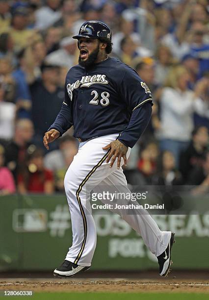Prince Fielder of the Milwaukee Brewers yells as he comes in to socre a run against the Arizona Diamondbacks during Game Two of the National League...