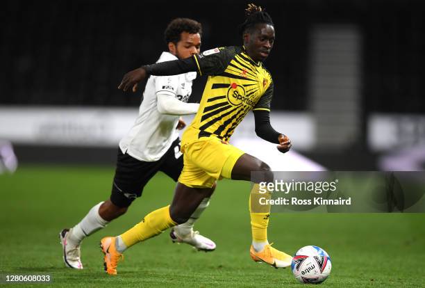 Domingos Quina of Watford and Duane Holmes of Derby County during the Sky Bet Championship match between Derby County and Watford at Pride Park...