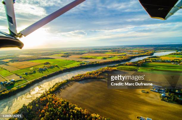 view of ground from ultra light plane - hang glider stock pictures, royalty-free photos & images