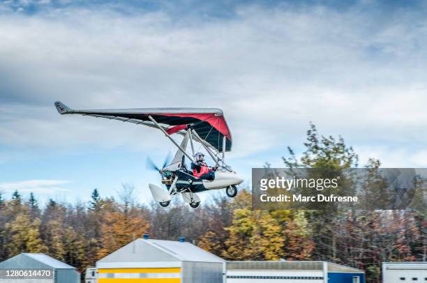 ultra light plane lifting off from ground - ulm stock pictures, royalty-free photos & images