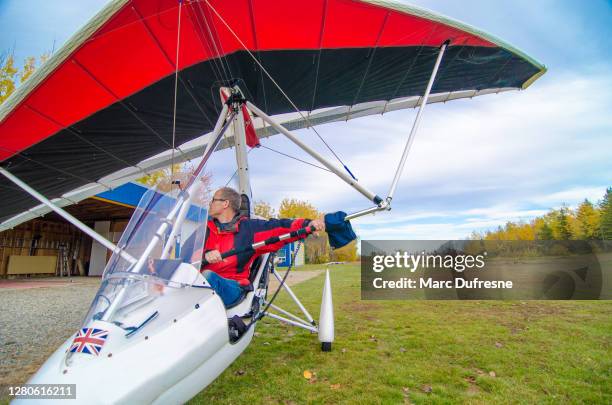 pilot preparing to fly in his ultra light plane - ulm stock pictures, royalty-free photos & images
