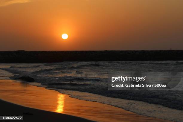 scenic view of sea against sky during sunset,barranquilla,atlantico,colombia - barranquilla fotografías e imágenes de stock