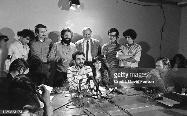American political activists and antiwar demonstrators known as the Chicago Seven speak to reporters at a press conference after being charged with...