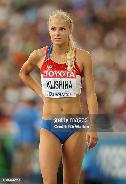 Darya Klishina of Russia looks up at the giant screen in the stadium in the women's Long Jump final during day two of 13th IAAF World Athletics...