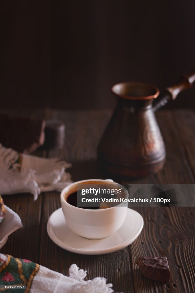 High angle view of coffee cup on table