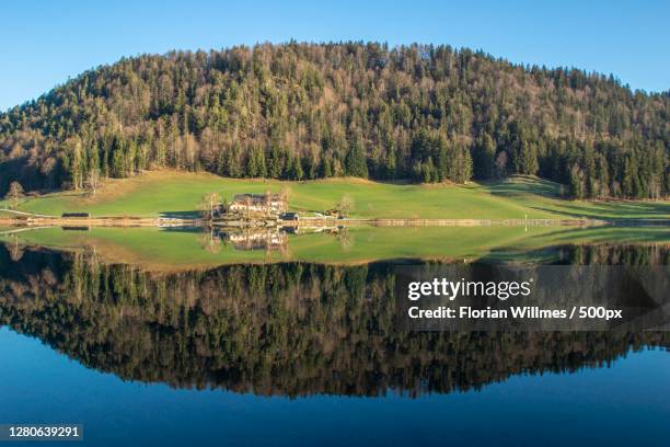 scenic view of lake against clear blue sky, kufstein, tirol, austria - クーフシュタイン ストックフォトと画像