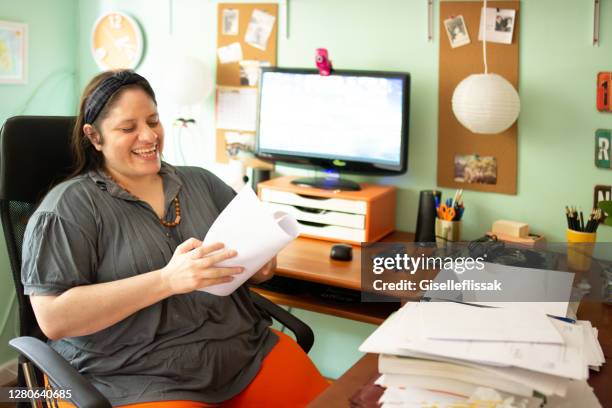 woman working at her home office - showus office stock pictures, royalty-free photos & images