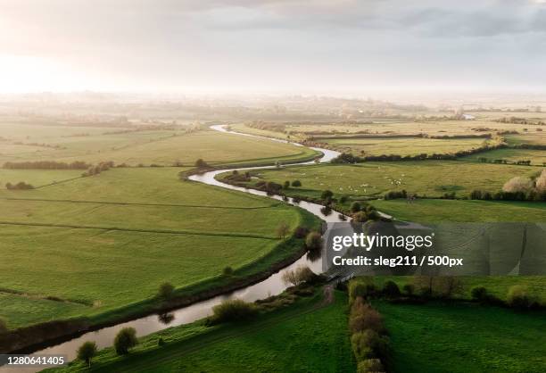 high angle view of agricultural field against sky, route des joncs, carentan les marais, france - region photos et images de collection