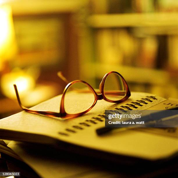 Spectacles On Book High-Res Stock Photo - Getty Images