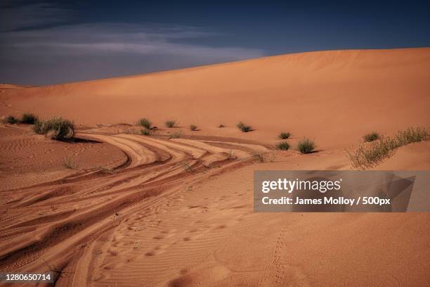 scenic view of desert against sky, morocco - sandy molloy stock pictures, royalty-free photos & images