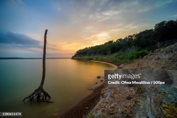 scenic view of sea against sky during sunset,grapevine,texas,united states,usa - grapevine texas stock pictures, royalty-free photos & images