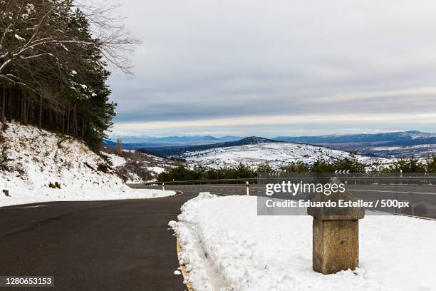 scenic view of snow covered mountains against sky,la torre,spain - meteorologie stock pictures, royalty-free photos & images