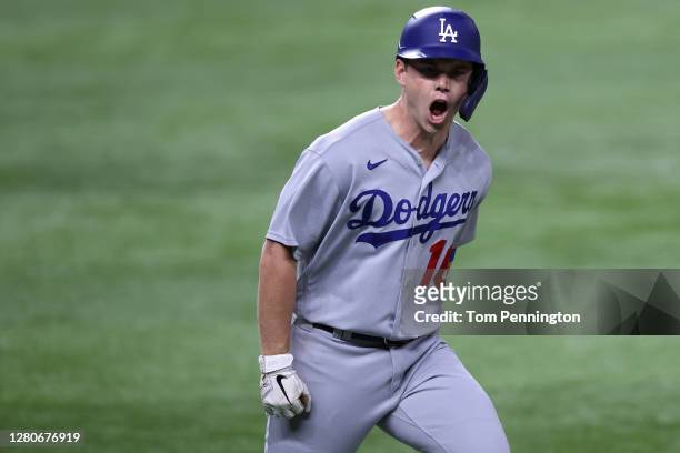 Will Smith of the Los Angeles Dodgers celebrates his three run home run against the Atlanta Braves during the sixth inning in Game Five of the...