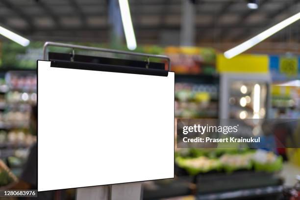 blank white supermarket banners hanging from ceiling - shopping centre ad stock pictures, royalty-free photos & images