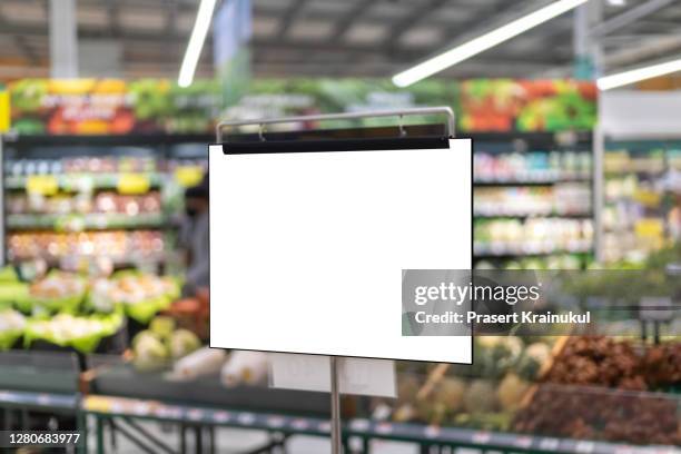 blank white supermarket banners hanging from ceiling - grocery store window stock pictures, royalty-free photos & images