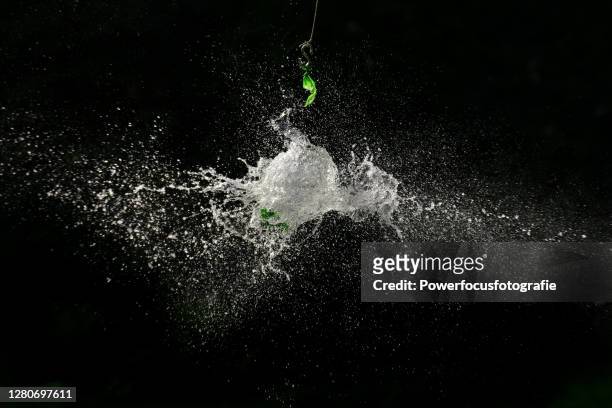 high speed shot - blowing up balloon stock-fotos und bilder