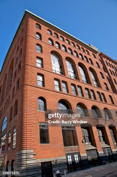 de vinne press building, built in romanesque style on lafayette street, new york, ny, usa - brick arch stock pictures, royalty-free photos & images