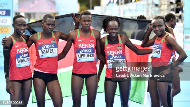 Peres Jepchirchir of Kenya celebrates with teammates Rosemary Wanjiru , Dorcas Jepchumba Kimeli , Brillian Jepkorir Kipkoech and Joyciline Jepkosgei...