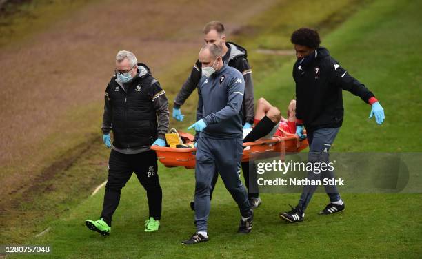 Darron Gibson of Salford City is stretchered off injured during the Sky Bet League Two match between Port Vale and Salford City at Vale Park on...