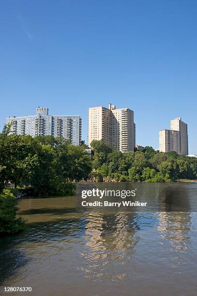 riverdale apartment buildings seen from inwood hill park, new york, ny - riverdale stock pictures, royalty-free photos & images