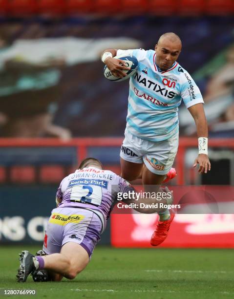 Simon Zebo of Racing 92 is tackled by Luke Cowan-Dickie of Exeter Chiefs during the Heineken Champions Cup Final match between Exeter Chiefs and...