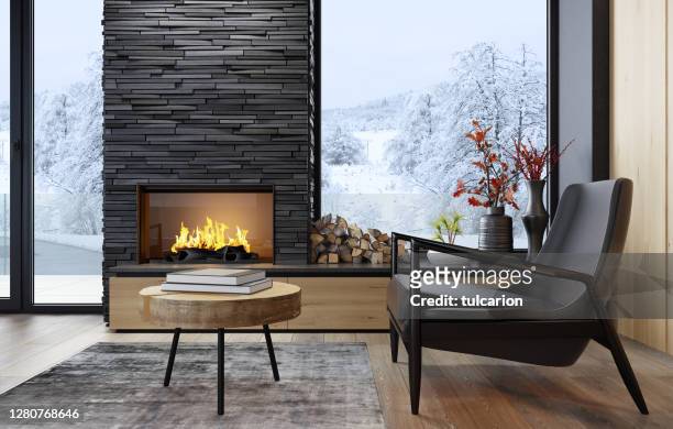 country villa modern interior living room area with fireplace and black slate stone chimney. - clean slate stock pictures, royalty-free photos & images
