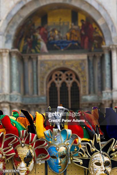 carnival masks displaying in san marco square, venice, italy - italian carnival stock pictures, royalty-free photos & images