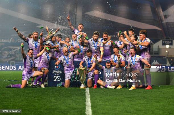 Exeter Chiefs captains Jack Yeandle and Joe Simmonds celebrate with teammates and the Heineken Champions Cup trophy after victory in the Heineken...