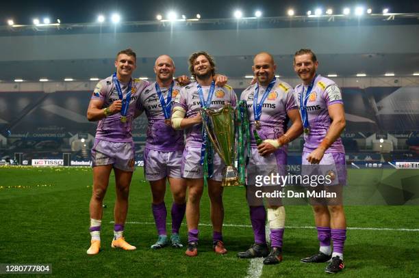 Henry Slade, Jack Yeandle, Alec Hepburn, Ben Moon and Gareth Steenson of Exeter Chiefs pose with the trophy after victory in the Heineken Champions...