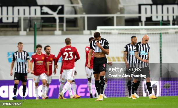 Joelinton of Newcastle United reacts to his side conceding their first goal but it is later ruled out during the Premier League match between...