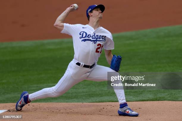 Walker Buehler of the Los Angeles Dodgers delivers the pitch against the Atlanta Braves during the first inning in Game Six of the National League...