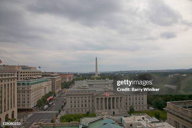 aerial view, u.s. treasury department with washington monument in distance, washington, d.c., u.s.a. - washington dc aerial stock pictures, royalty-free photos & images