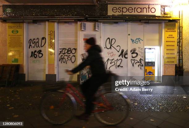 Late night shop is closed just after 11pm on October 17, 2020 in Berlin, Germany. About 11 bars and restaurants in city led a successful challenge to...