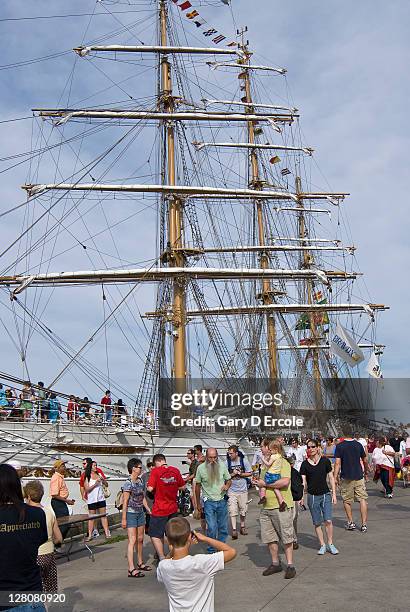 people visiting docked tall ships docked in boston, ma - boston ma stock pictures, royalty-free photos & images