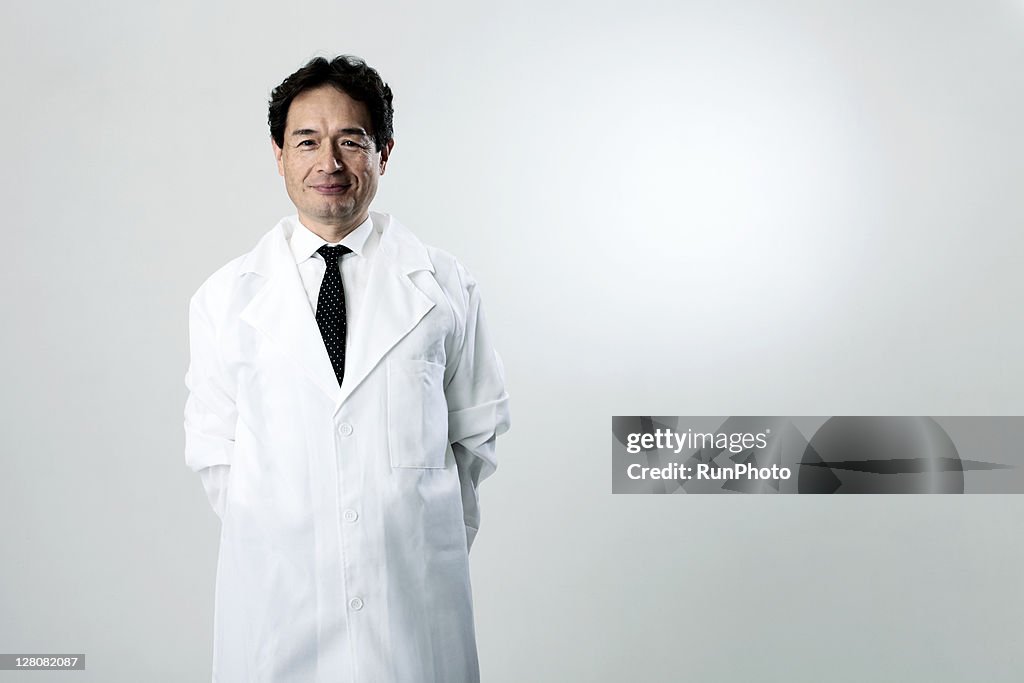 Old age doctor smiling,portrait
