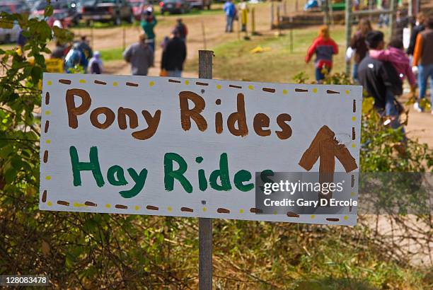 pony ride/hay ride sign at orchard, massachusetts - hayride stock pictures, royalty-free photos & images