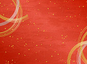 Mizuhiki decoration and Japanese paper texture red background with Gold powder