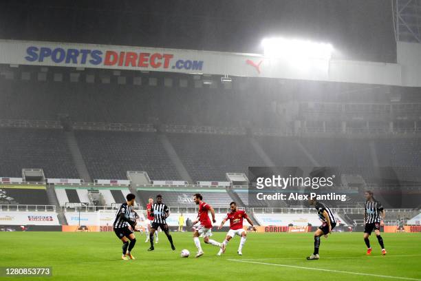 General view as rain comes down during the Premier League match between Newcastle United and Manchester United at St. James Park on October 17, 2020...