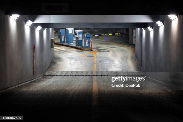 the entrance of the underground garage - parking entrance fotografías e imágenes de stock