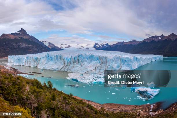 panorama of glacier perito moreno in patagonia - glacier stock pictures, royalty-free photos & images