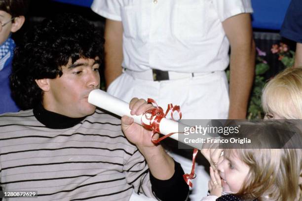 Diego Armando Maradona, his wife Claudia Villafane and his daughter Dalma Maradona attend a dinner at the Capri's SSC Naples Fan Club on June 9, 1989...