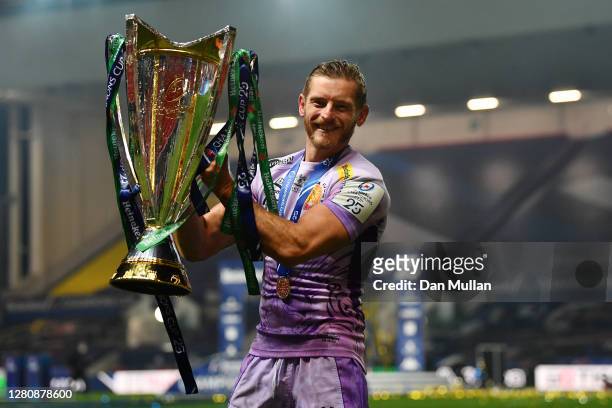 Gareth Steenson of Exeter Chiefs poses with the trophy following his side's victory during the Heineken Champions Cup Final between Exeter Chiefs and...