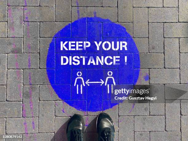 “keep your distance” signage / covid-19 - hungary covid stock pictures, royalty-free photos & images
