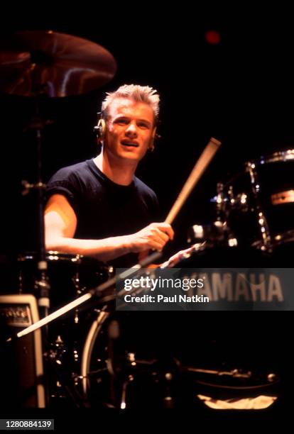 Irish Rock musician Larry Mullen Jr, of the group U2, performs onstage during the Amnesty International benefit concert at the Rosemont Horizon,...