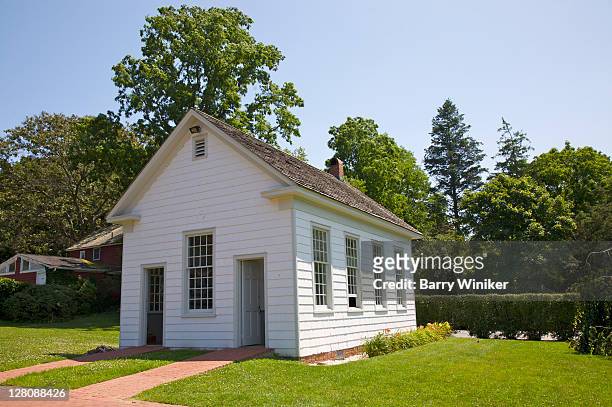 exterior of nassakeag schoolhouse, 1877, from south setauket, two front doors, school separated by gender, the long island museum of american art, history and carriages, formerly the museums at stony brook, stony brook, ny, u.s.a. - segregation stock pictures, royalty-free photos & images