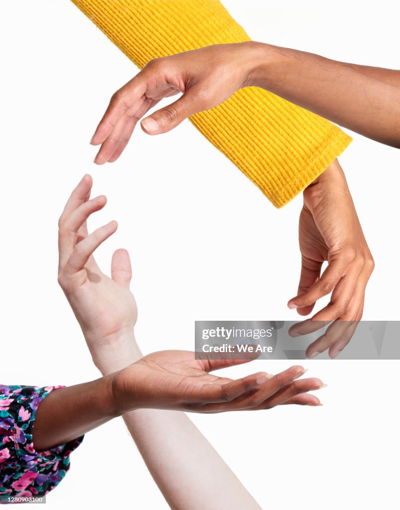 Hands forming a circle