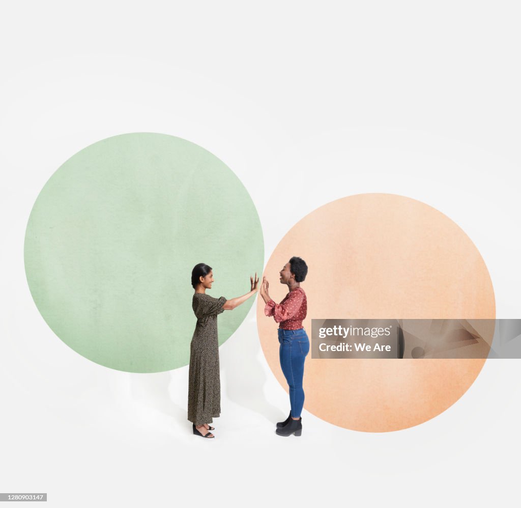 Two people meeting in bubble